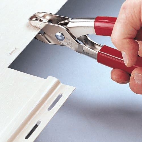 Malco Sl5 Snap Lock Punch in use